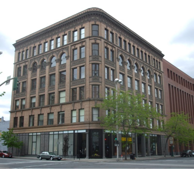 The north east corner showing the two decorative faces