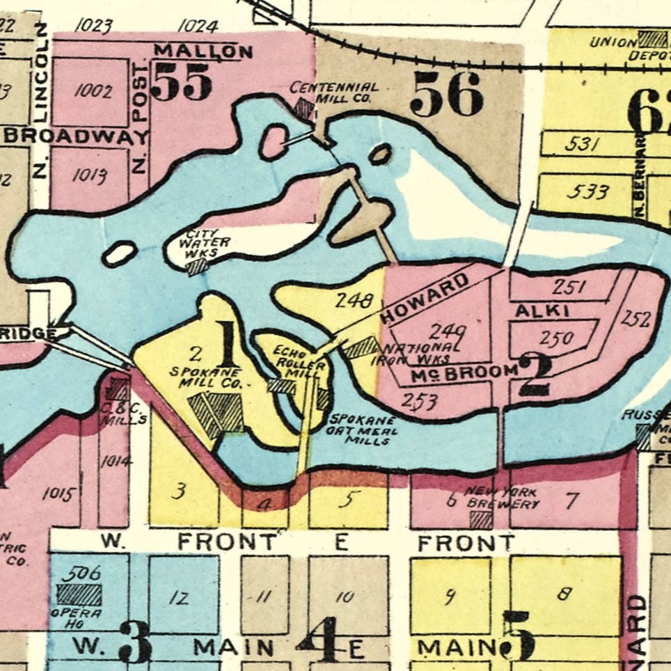 A detail from a color-coded map of Spokane in 1891 as produced by the Sanborn Fire Insurance company. It shows the City Water Works labeled on the southwest part of the smaller island in the river, within the area that is Riverfront Park today.